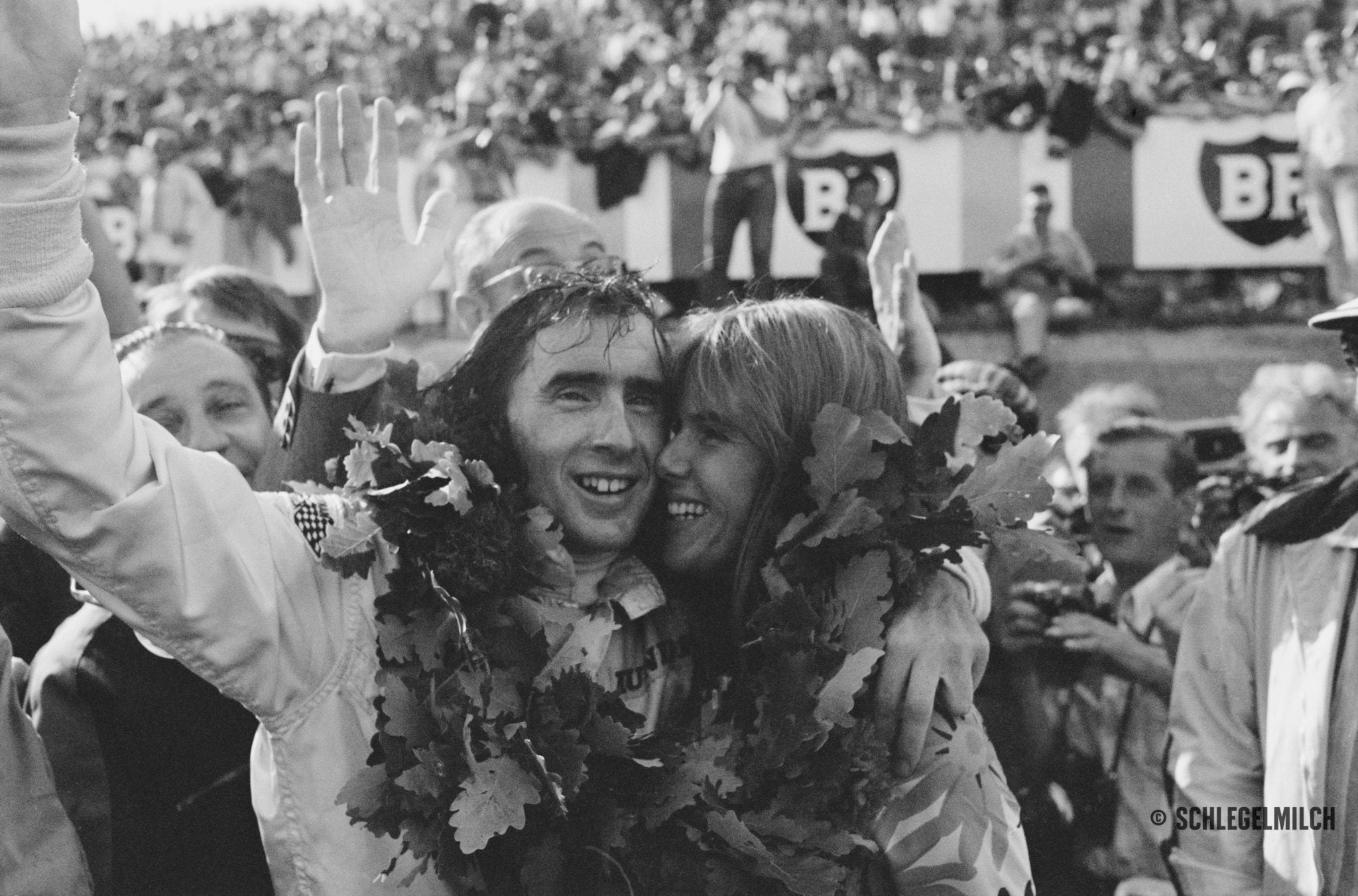 Jackie Stewart of Great Britain, driver of the #2 Matra International Matra MS80 Ford Cosworth DFV V8 celebrates with his wife Helen