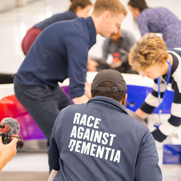 work with race against dementia - F1 mindset